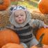 Baby in Halloween Costume with Pumpkins | Oak Grove KY apartments