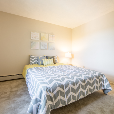 Bedroom with carpet at Princeton Crossing | Apartment for Rent in Salem, MA