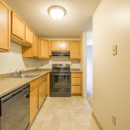Modern kitchen with black appliances | Princeton Place | Apartment For Rent Worcester MA