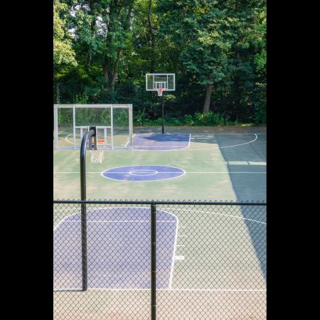 Outdoor basketball courts at Princeton Bradford apartments near Haverhill, MA.