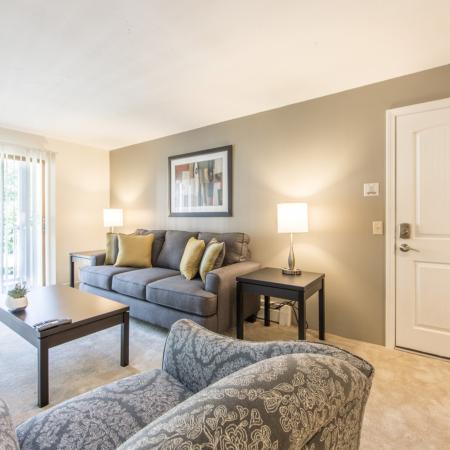 Light Infused Living Room  in apartment at Pheasant Run  | Nashua NH Apartments