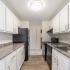 Upgraded Kitchens with white cupboards  in apartment at Pheasant Run  | Nashua NH Apartments