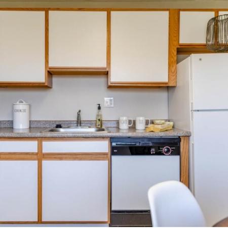 Kitchen including all white appliances | at Princeton Reserve | Apartments Dracut MA
