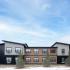 exterior building with blue sky at riverview trail apartments in whitefish montana