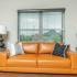 Orange leather couch in studio apartment in Galloway