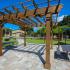 River View Apartments, exterior, pergola covered grill and picnic table