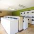 River View Apartments, interior, laundry facilities, washers and dryers, tile floor, folding counters