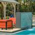 Calibre Bend Apartments outdoor pool: water fountain into pool, outdoor furniture.