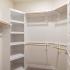 Walk-in closet with built in shelving