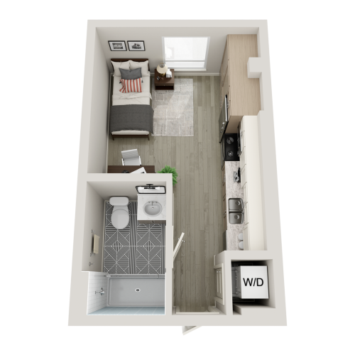 Studio floorplan with a bed, desk, full kitchen, full bathroom, storage closet, and washer dryer.