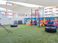 Outdoor Fitness Area with Equipment  at The Carmin | Tempe Apartments near ASU