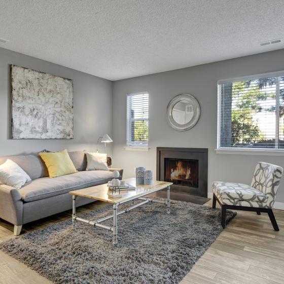 Elegant Living Area with Fireplace | Apartments Near Aurora CO | The Grove at City Center Apartments