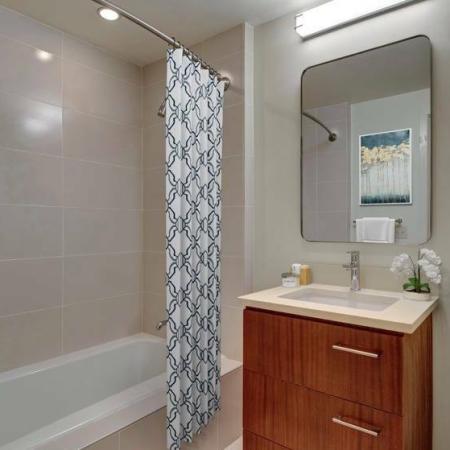Elegant Bath with Soak-In Tub and Well Lit Vanity | Portland Oregon Apartments | The Ardea