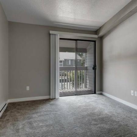 Living Room with Balcony Access | Apartments for Rent in Beaverton Oregon | Arbor Creek