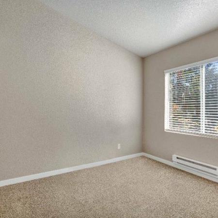 Guest Bedroom with Large Windows  | Renton WA Apartments | Westview Village
