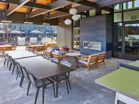 Outdoor Lounge with Fireplace | Edgewood Washington Apartments | 207 East