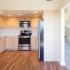 Kitchen with stainless steel appliances and inset lighting