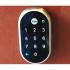 View of Nest brand, Yale model keyless apartment entry pad