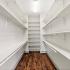 Large Walk In Closets with Floor to Ceiling Storage