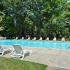 Community pool with lounge chairs at Valley Stream Apartments in Lansdale, PA.