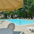 Community pool with lounge chairs at Valley Stream Apartments in Lansdale, PA.