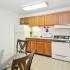 Kitchen with table and chairs at Country Manor apartments for rent in Levittown, PA