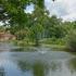 Landscaped grounds and pond around the property of Whiteland West Apartments in Exton, PA.