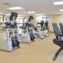 Fitness center with treadmills, ellipticals, and stepping machines at Valley Forge Suites in King of Prussia, PA.