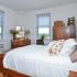 Spacious decorated bedroom with windows at Gilpin Place apartments in Wilmington, DE