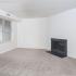 Living room with a fireplace at Fox Run apartments for rent in Warminster, PA