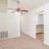 Dining room with a fan and kitchen view at Cedar Tree Village apartments for rent in Wilmington, DE