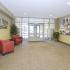 Lobby with red chairs at City View apartments for rent in Lancaster, PA