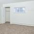 Bedroom with a closet and window at Black Hawk apartments for rent in Downingtown, PA