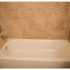 Tiled tub shower at Willow Ridge Apartments in Marlton, NJ.