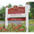 Welcome sign landscaped with flowers at the entrance of Willow Ridge Apartments in Marlton, NJ.