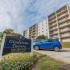Blue welcome sign at Gladstone Towers apartments for rent in Lansdowne, PA
