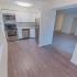 Large kitchen with appliances and a ceiling fan at Caln East apartments for rent