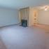 Fireplace in large carpeted living area in West Chester apartment for rent