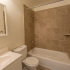 Model bathroom with vanity sink, toilet and tub shower at Wyntre Brooke apartments in West Chester, PA.