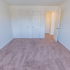 Carpeted model bedroom at Polo Ridge apartments in Burlington, NJ.
