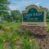 Green welcome sign at Caln East apartments for rent in Downingtown, PA