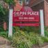 Green welcome sign at Gilpin Place apartments for rent in Wilmington, DE