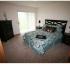 Larger Bedroom in One Bedroom with a Den