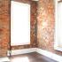 Brick Walls and Tall Windows Pleasant Living Room | Maven @ 806 | Apartments For Rent Louisville, KY