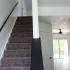 B3 - Renovated Apartment - View of carpeted stairs from the bottom going up at  | The Residence at Turnberry | Columbus Apartments