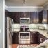 Kitchen with stainless steel appliances - Greenwood Reserve | Kansas City Apartments