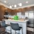 Spacious Open Kitchen with Breakfast Bar  | Avail | Aurora Apartments