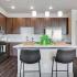 Spacious Open Kitchen with Breakfast Bar  | Avail | Aurora Apartments