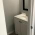 Bathroom sink & mirror at Steeplechase Village; South Columbus, Ohio Apartments