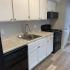 Black appliances in Prep-friendly Kitchen at Brittany Bay; Townhomes in Groveport, OH